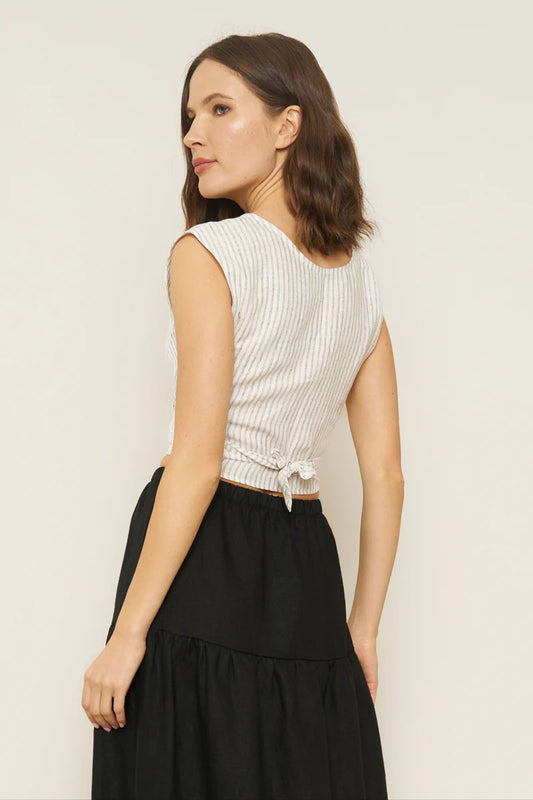Image of model wearing Whimsy + Row Valentina Tie Top in Stripe Linen. Valentina Top is a square shoulder crop top with tie closure that can be worn back to front. Made in Los Angeles.