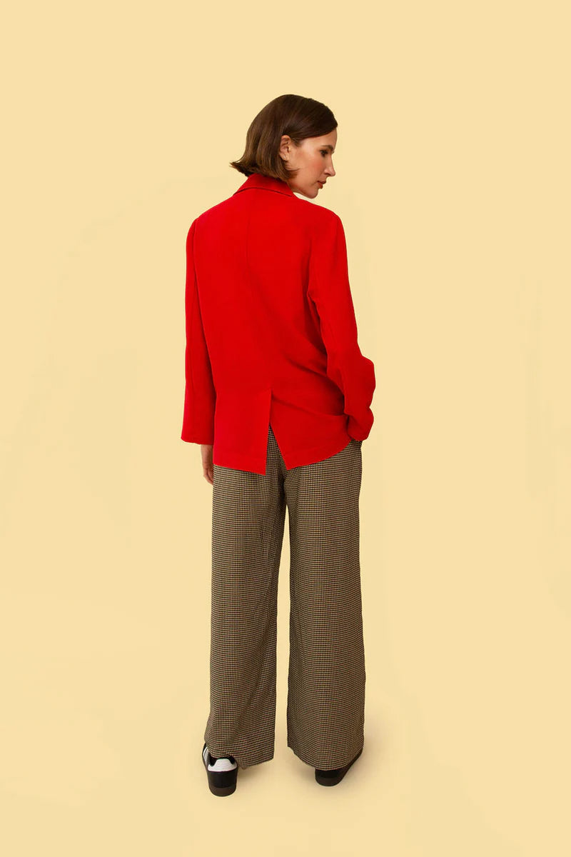 Image on model of Whimsy and Row Cherry Red TENCEL Parker Blazer styled over Black jumpsuit _ Ethical Women's Fashion _ Made in Los Angels USA Women's Apparel